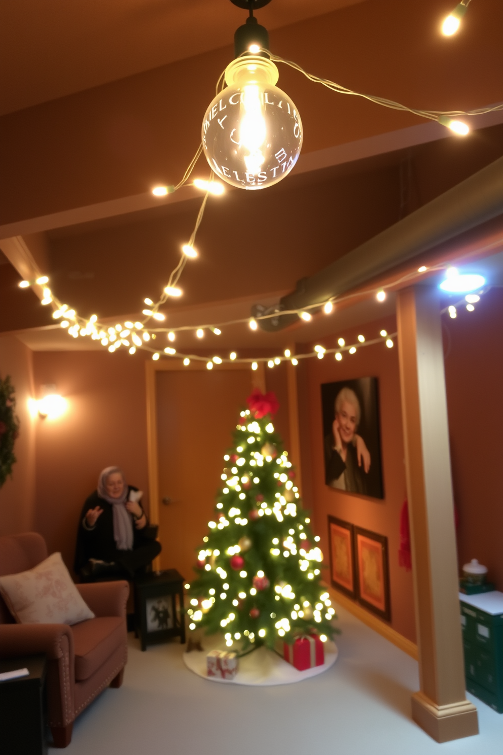 A cozy basement decorated for Christmas features festive string lights draped elegantly across the ceiling. The warm glow of the lights creates a cheerful atmosphere, complemented by a beautifully adorned Christmas tree in the corner.