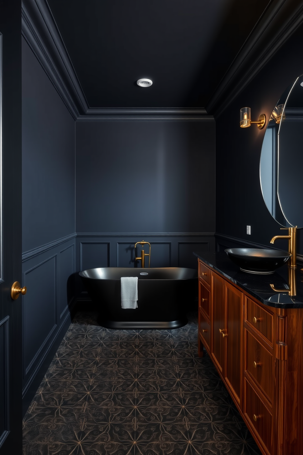 A full bathroom design featuring dark moody colors that create a dramatic and luxurious atmosphere. The walls are painted a deep navy blue, complemented by a sleek black freestanding bathtub and gold fixtures that add a touch of elegance. The vanity is crafted from rich mahogany with a black granite countertop, showcasing a stylish vessel sink. Ambient lighting highlights the intricate tile work on the floor, which features a mix of dark gray and black geometric patterns.
