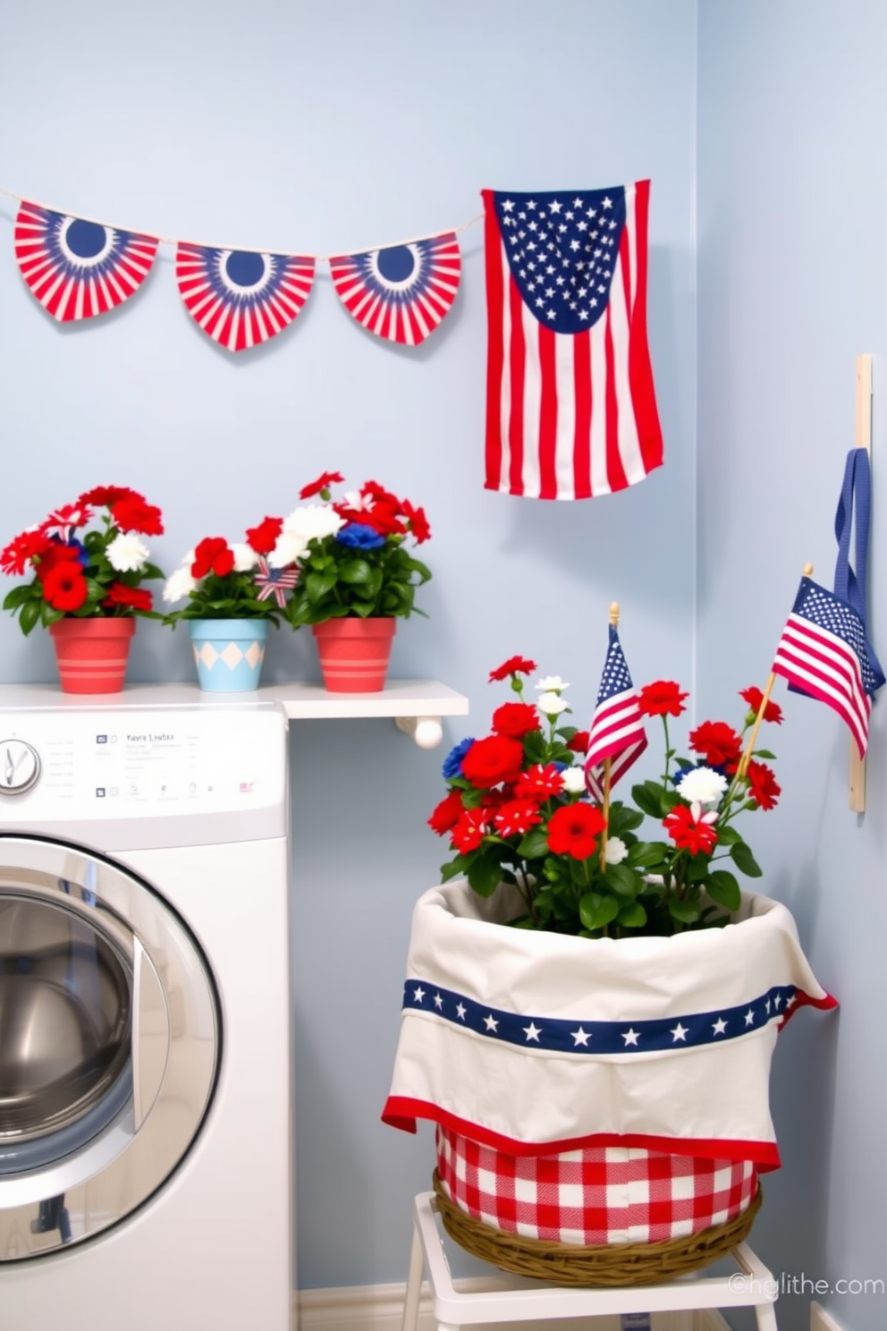 Patriotic potted plants are arranged on a shelf in the laundry room, featuring red white and blue flowers in decorative pots. The walls are painted a light blue shade, and a festive banner with stars and stripes hangs above the washer and dryer. A charming laundry basket sits in the corner, adorned with a red and white checkered fabric. A small American flag is placed in one of the potted plants, adding a touch of holiday spirit to the space.