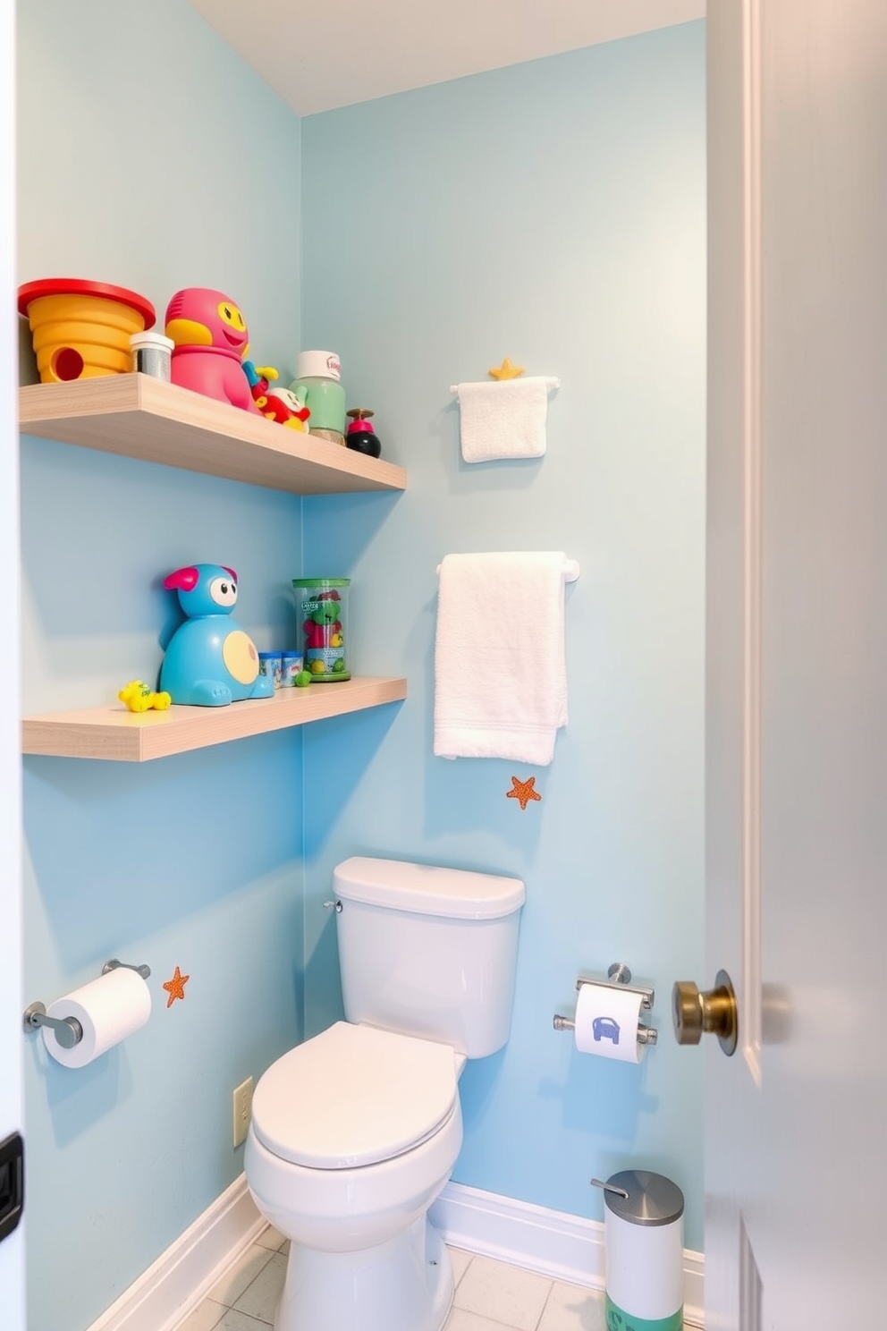 A playful kids bathroom featuring floating shelves that provide easy access to colorful toys. The walls are painted in a cheerful light blue, complemented by fun, whimsical decals of sea creatures.
