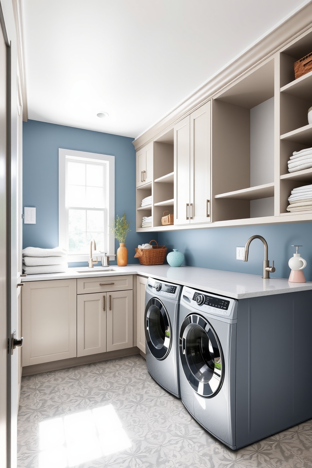 A spacious multi-functional laundry room features a combination of sleek cabinetry and open shelving for optimal storage. The room is equipped with a modern washer and dryer set, with a large countertop for folding clothes and a deep sink for hand-washing delicate items. Natural light floods the space through a large window, enhancing the airy atmosphere. The walls are painted in a soft blue hue, complemented by a durable, patterned tile floor that is both stylish and easy to clean.