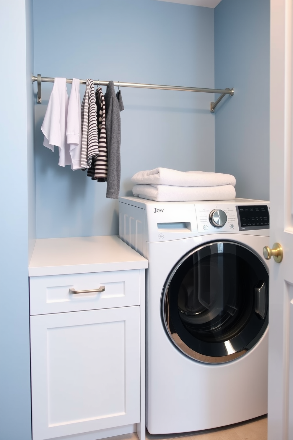 A modern laundry room featuring a top-loading washer and a sleek countertop for folding clothes. The walls are painted in a soft blue hue, and a wall-mounted drying pole for clothes is installed above the countertop for convenience.