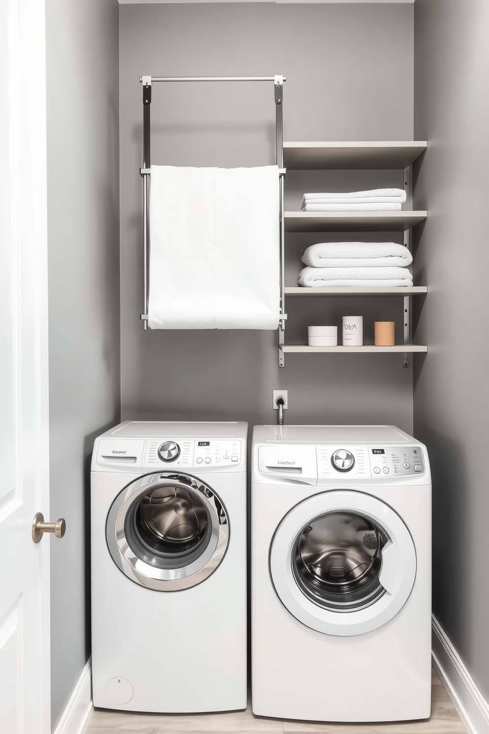 A modern laundry room featuring a top loading washer positioned next to a sleek drying rack mounted above it. The walls are painted in a soft gray hue, complemented by minimalist shelving that holds neatly folded towels and laundry supplies.