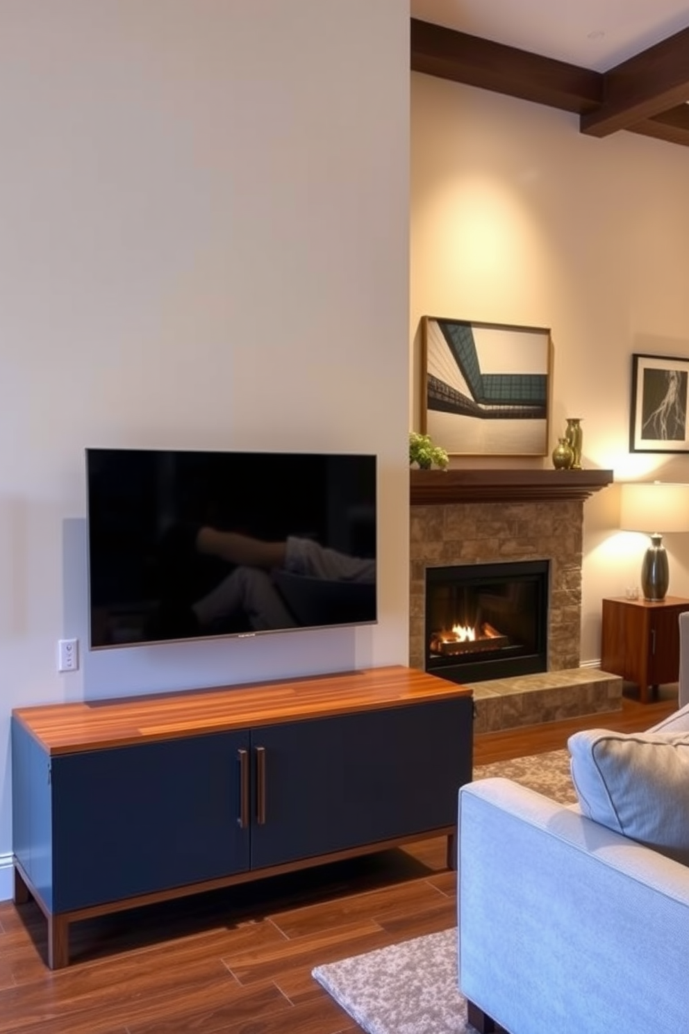 A sleek media console sits elegantly beneath the mounted television in a contemporary living room. The console features clean lines and a rich wood finish, complementing the warm ambiance created by the inviting fireplace nearby. The walls are adorned with tasteful art pieces, and plush seating arrangements invite relaxation. Soft lighting enhances the cozy atmosphere, making it a perfect space for entertainment and gatherings.