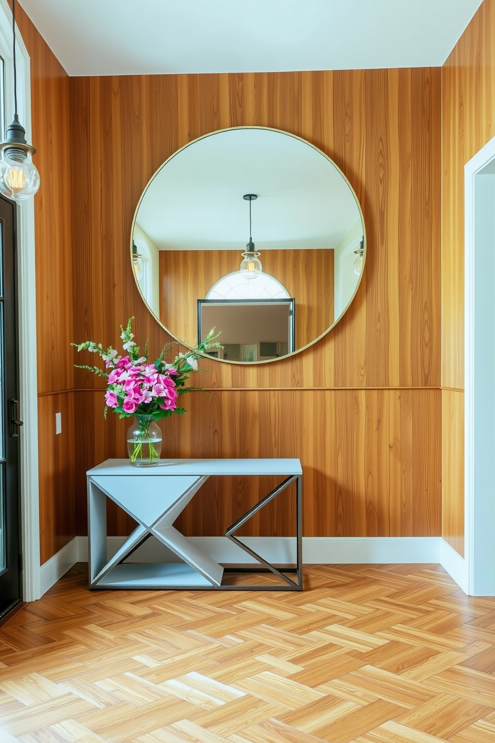 A large round mirror hangs prominently in the foyer, enhancing the sense of space and light. The walls are adorned with warm wood paneling, complemented by a sleek console table featuring geometric lines and a vibrant vase of fresh flowers. The flooring showcases a rich herringbone pattern, adding texture and warmth to the entrance. Stylish pendant lights with a vintage flair illuminate the area, creating an inviting atmosphere that welcomes guests.