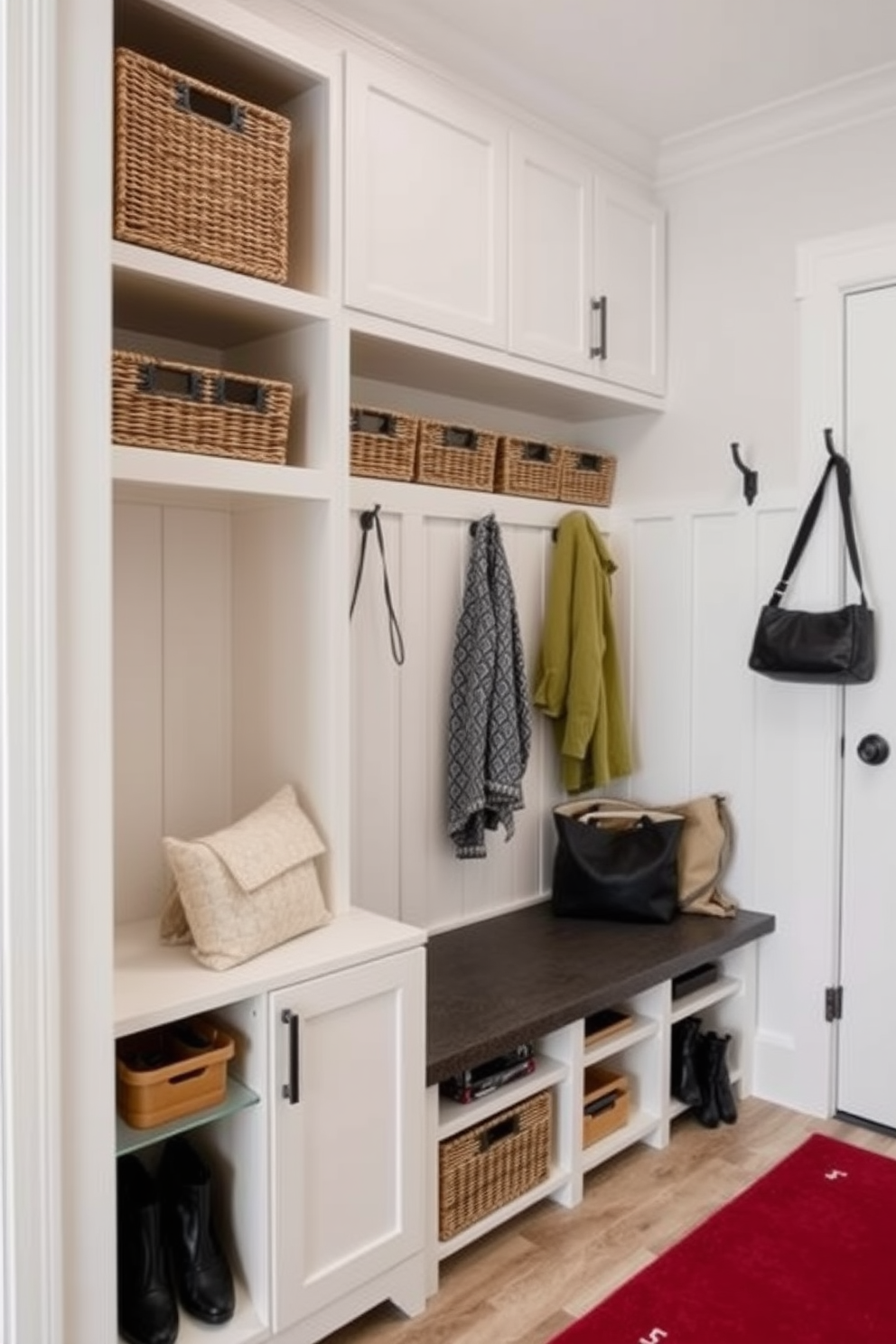 A modern mudroom featuring smart storage solutions that incorporate stylish baskets. The space includes built-in cabinetry with a bench for seating, and the walls are adorned with hooks for coats and bags.