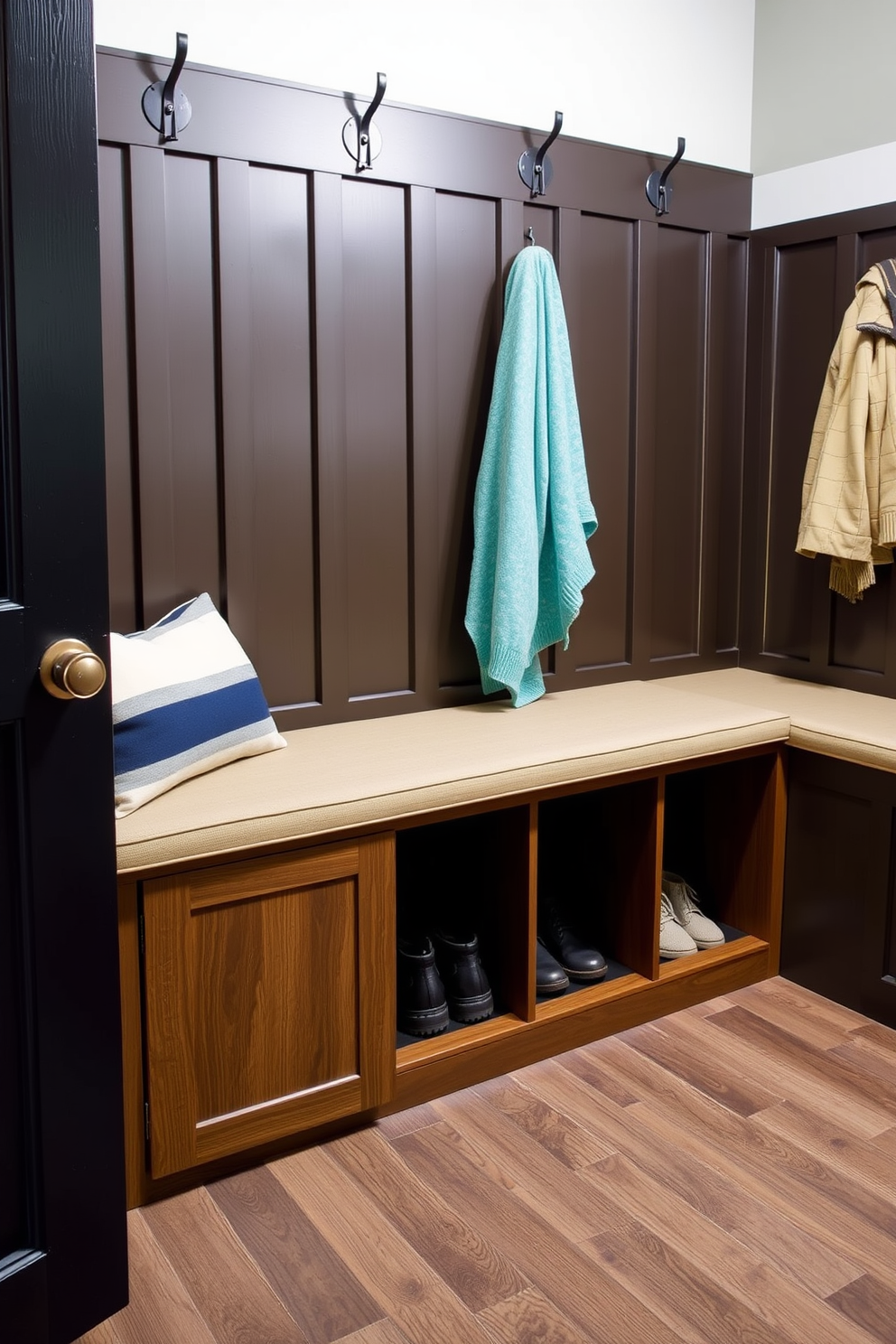 A stylish mudroom features a bench with a sliding door compartment for convenient storage. The bench is upholstered in a durable fabric, and the compartment is designed to hold shoes and outdoor gear neatly out of sight.
