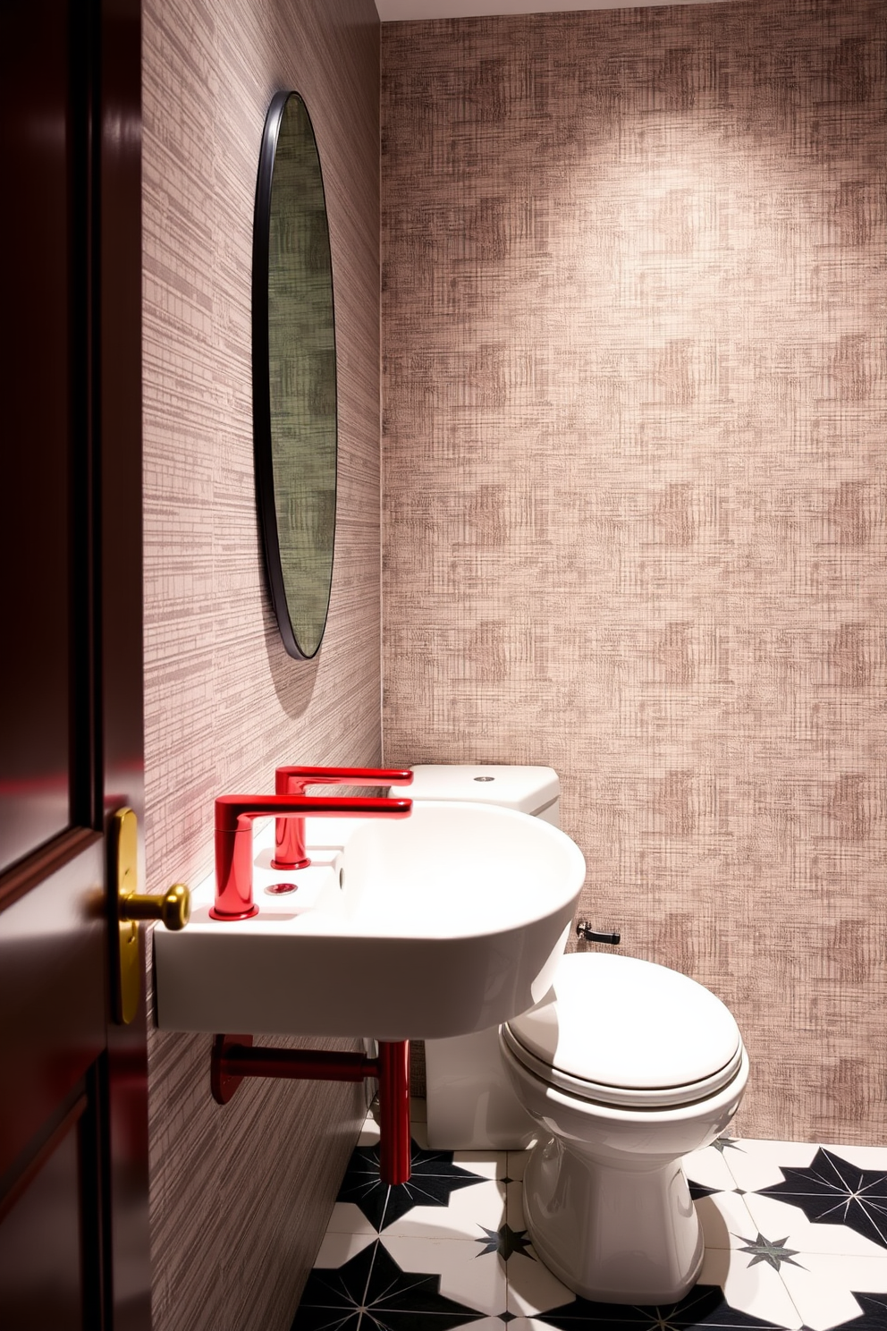 A modern powder room featuring sleek red faucets with clean finishes that create a striking focal point. The walls are adorned with a subtle textured wallpaper, and the floor is covered in elegant black and white tiles that complement the bold color scheme.