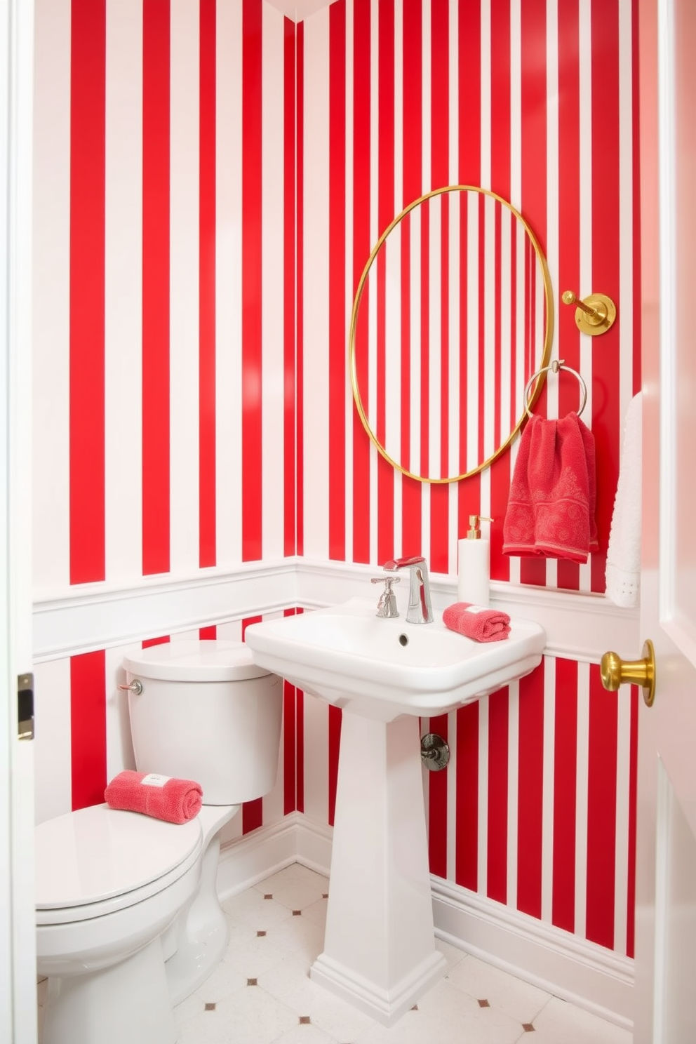 A striking red and white striped powder room features bold vertical stripes that create a dramatic effect. The sleek white fixtures, including a pedestal sink and modern toilet, contrast beautifully with the vibrant wall colors. A round mirror with a thin gold frame hangs above the sink, reflecting the lively atmosphere of the space. Accessories like a chic soap dispenser and plush towels in complementary colors enhance the overall design.