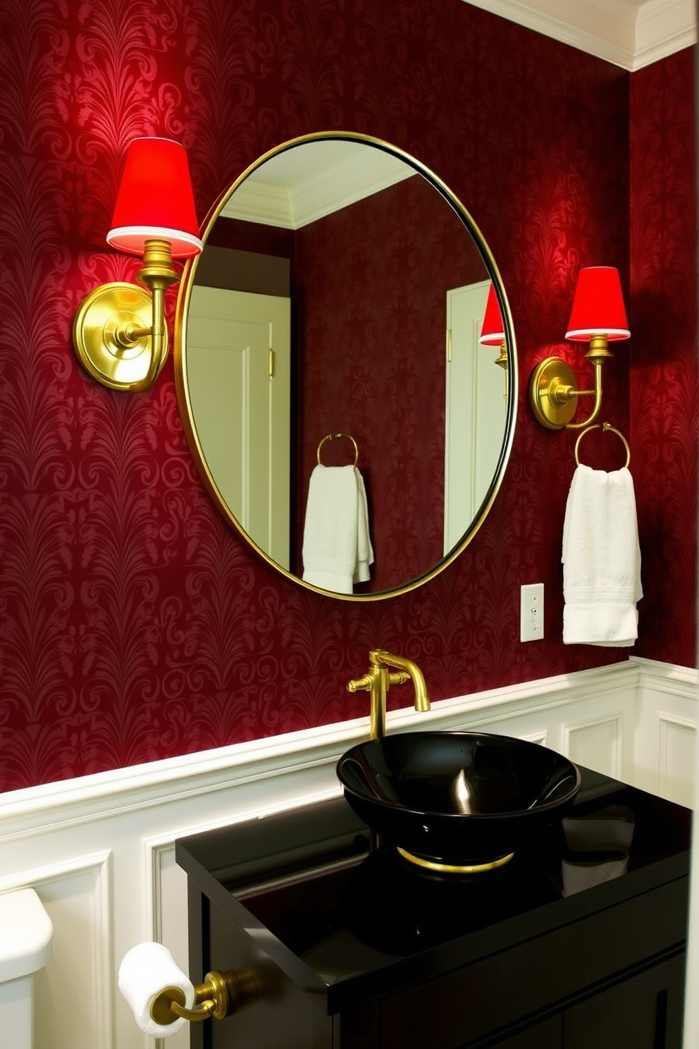 Elegant red sconces provide a warm and inviting glow in a chic powder room. The walls are adorned with rich burgundy wallpaper, creating a luxurious atmosphere that complements the sconces beautifully. The vanity features a sleek black countertop with a stylish vessel sink, framed by ornate gold fixtures. A large round mirror hangs above the vanity, reflecting the elegance of the room and enhancing the overall design.