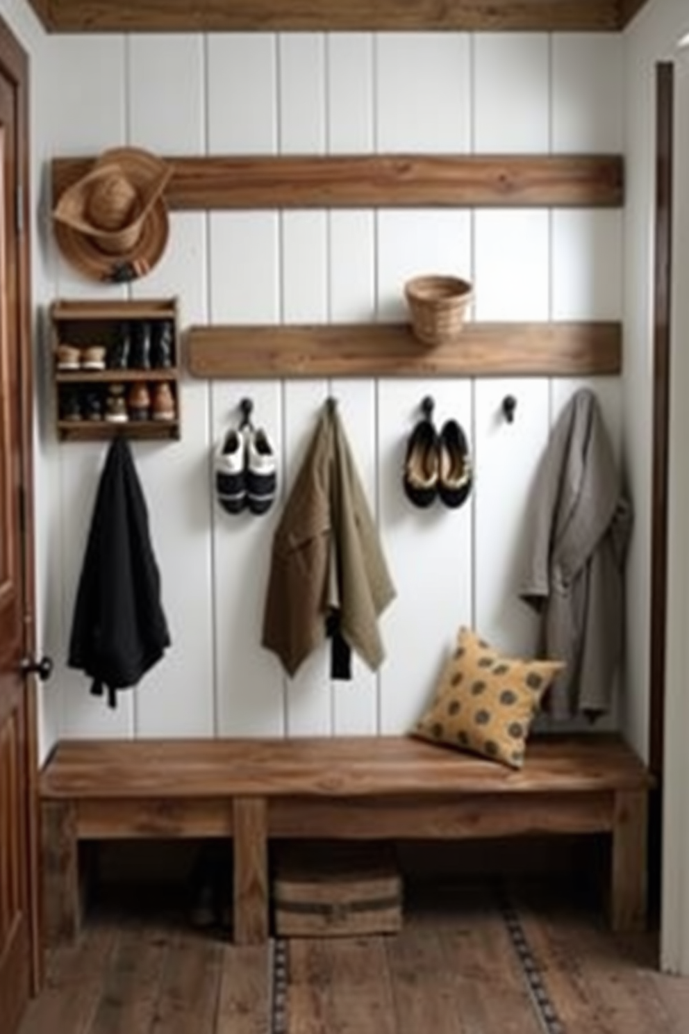 A pallet wood shoe rack sits against the wall, showcasing an array of neatly arranged shoes. The warm tones of the wood complement the earthy color palette of the rustic mudroom, creating an inviting atmosphere. The mudroom features reclaimed wood accents, including a bench with plush cushions for comfort. Vintage hooks line the wall, providing a practical yet charming space for coats and bags.