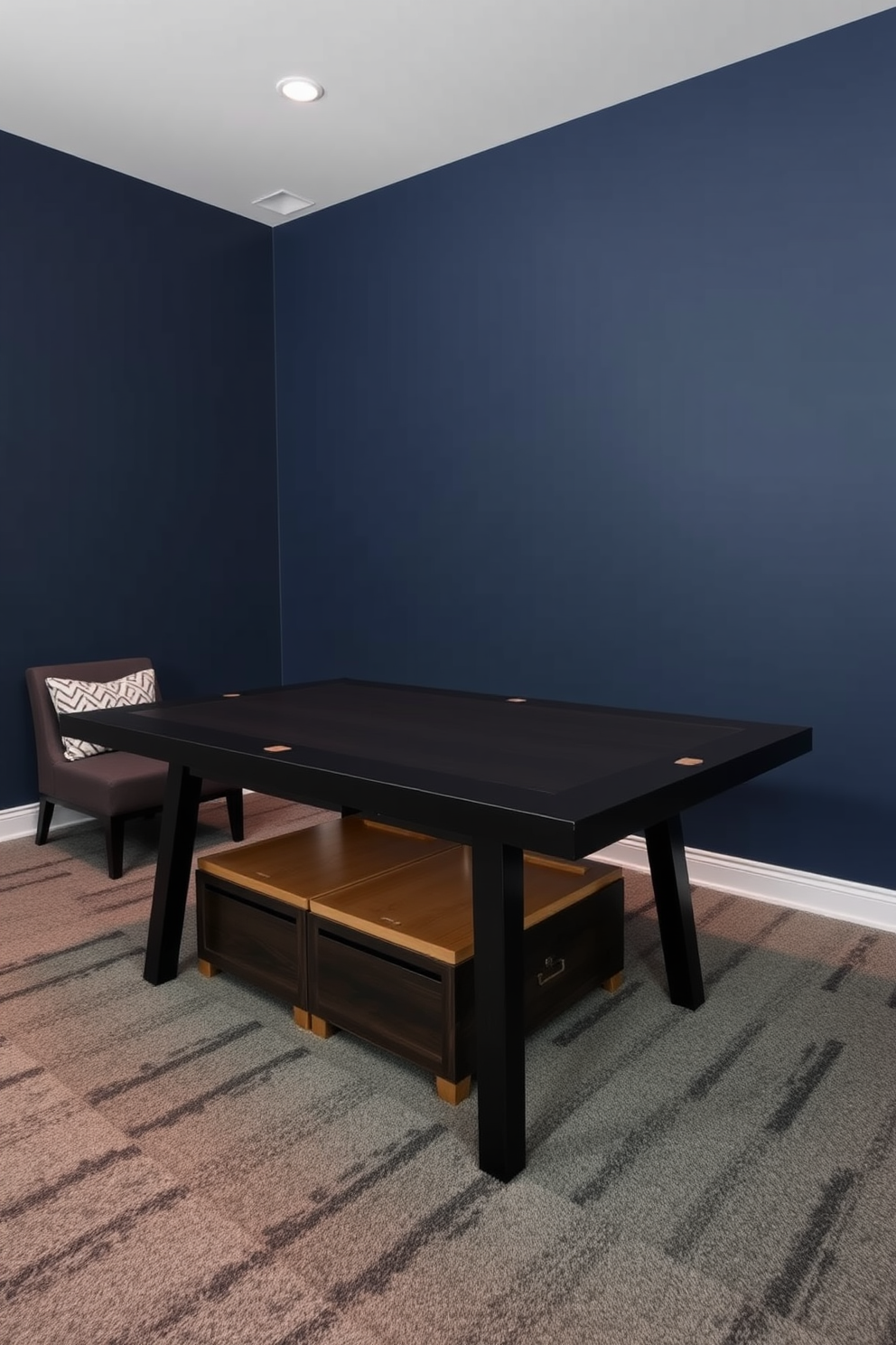 A cozy game room featuring a sleek gaming table with hidden storage compartments underneath. The walls are painted in a deep navy blue, and the floor is covered with a plush gray carpet for comfort.