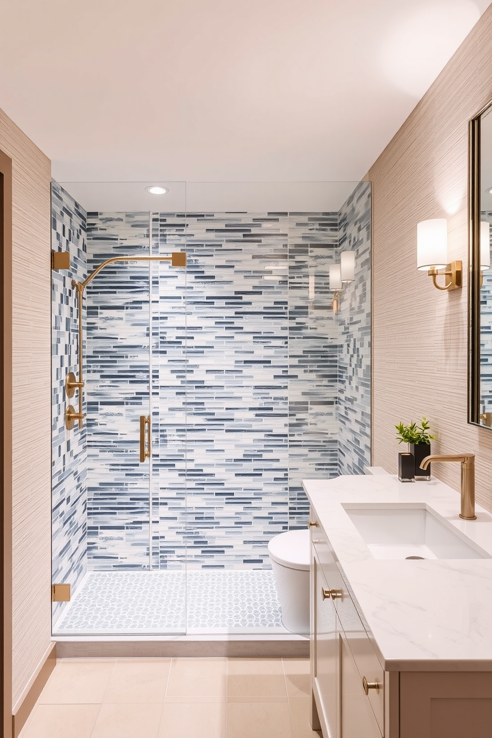 Textured wallpaper in a soft neutral tone adds depth to the space, creating a warm and inviting atmosphere. The split bathroom design features a seamless blend of functionality and style, with distinct areas for the shower and vanity. The shower area is enclosed with clear glass panels, showcasing beautiful tile work in shades of blue and white. Meanwhile, the vanity features a sleek, modern sink and ample storage, complemented by stylish lighting fixtures that enhance the overall elegance.
