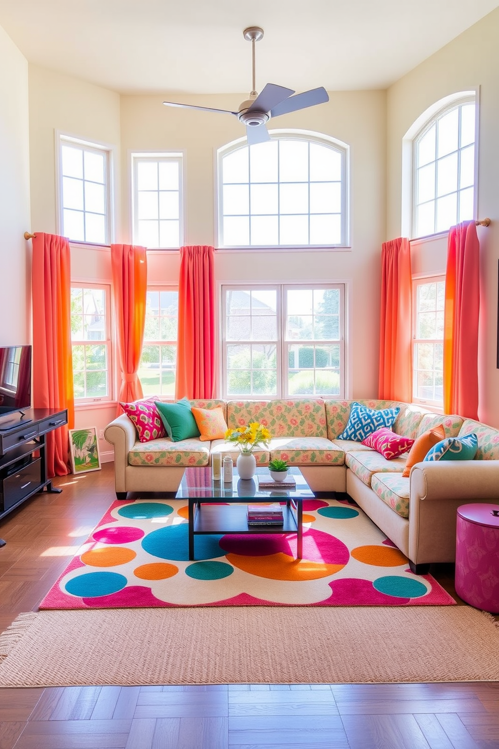 A vibrant game room filled with natural light. The walls are painted in a soft pastel color, and bright curtains frame the large windows, allowing sunlight to flood the space. A plush sectional sofa in a lively pattern anchors the room, complemented by colorful accent pillows. A stylish coffee table sits in the center, surrounded by a playful rug that adds warmth and texture to the floor.