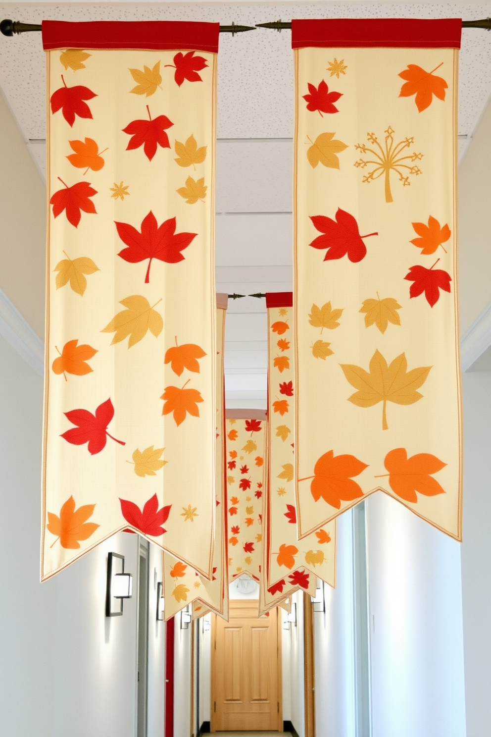 Hanging fabric banners adorned with intricate leaf patterns create a warm and inviting atmosphere in the hallway. The soft colors of the banners complement the autumnal theme, enhancing the festive spirit of Thanksgiving.