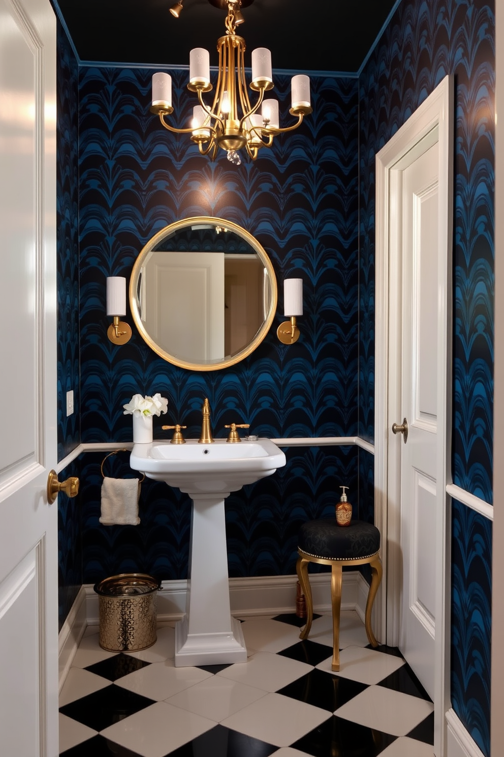 A vintage powder room with art deco accents features a bold geometric wallpaper in rich jewel tones. The room is adorned with a sleek pedestal sink and a round mirror framed in brushed gold, complemented by a stylish chandelier overhead. The flooring is a glossy black and white tile, adding a touch of elegance to the space. Decorative elements include a vintage-inspired vanity stool and an ornate soap dispenser, creating a cohesive glamorous atmosphere.